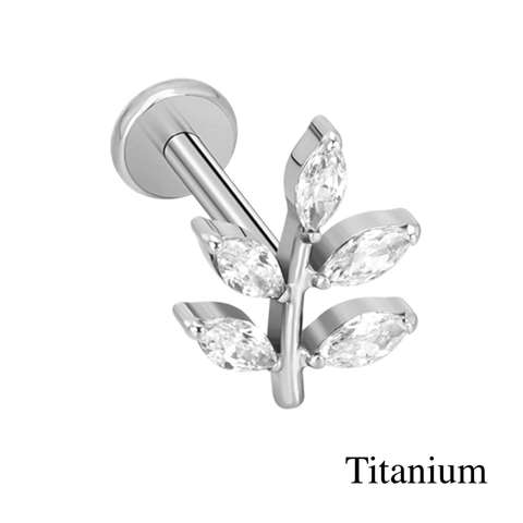 Labret/helix/tragus piercing in titanium F136 boom bedekt met witte kristallen