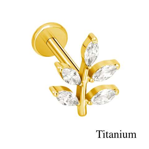 Labret/helix/tragus piercing in goud titanium F136 boom bedekt met witte kristallen