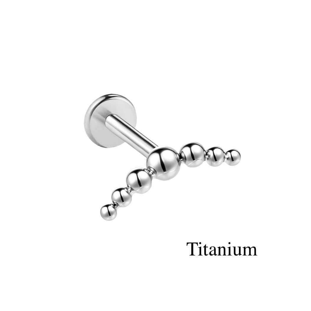 Labret/helix/tragus piercing in titanium F136 lus met kleine bolletjes