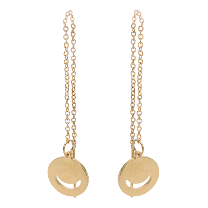 Earrings in steel, gold colored with a round motif